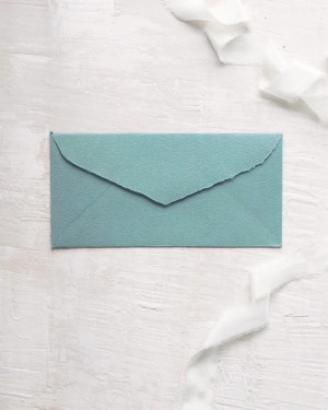 ABOUT HANDCRAFTED POWDER BLUE AMERICAN DL FOR WEDDING INVITATIONS.